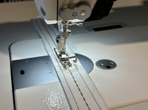 JUKI DDL-8000C straight-stitch industrial machine with automation